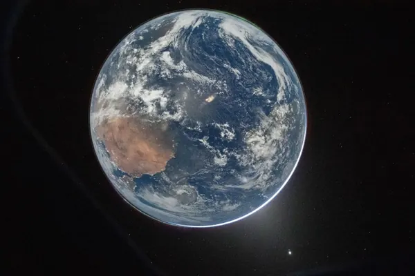 Artemis II Astronauts Capture Earth's Stunning Moonlit View