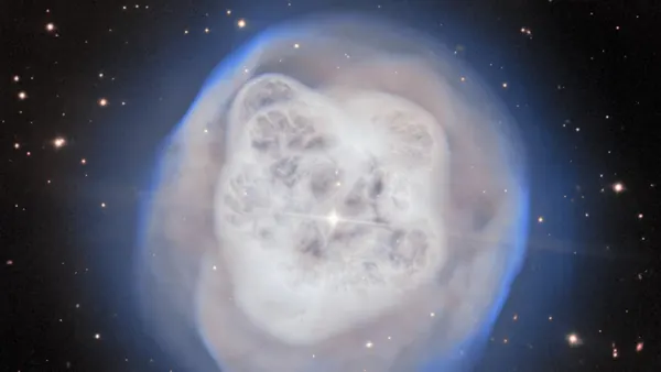Crystal Ball Nebula: Dying Star's Ethereal Glow Captured by Gemini North